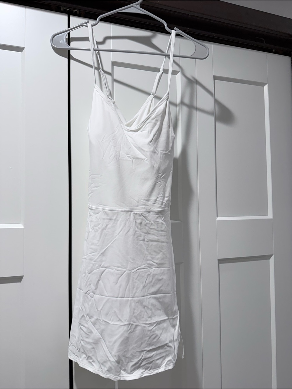 White athletic dress with built in shelf bra